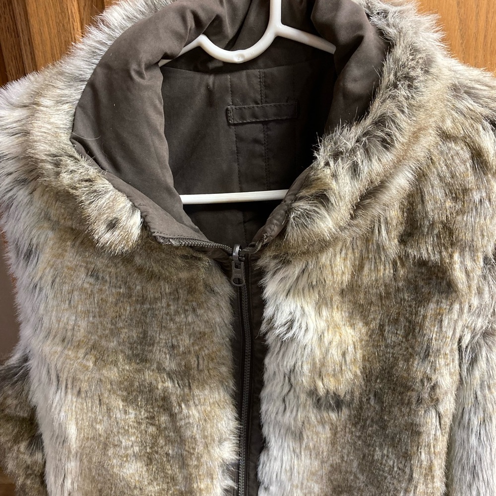 Reversible fur vest. Beautiful brown tones inside and out.